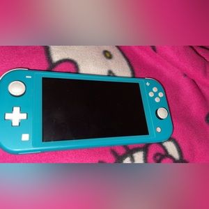 Switch lite blue with charger